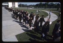 Graduates leaving Minges Coliseum